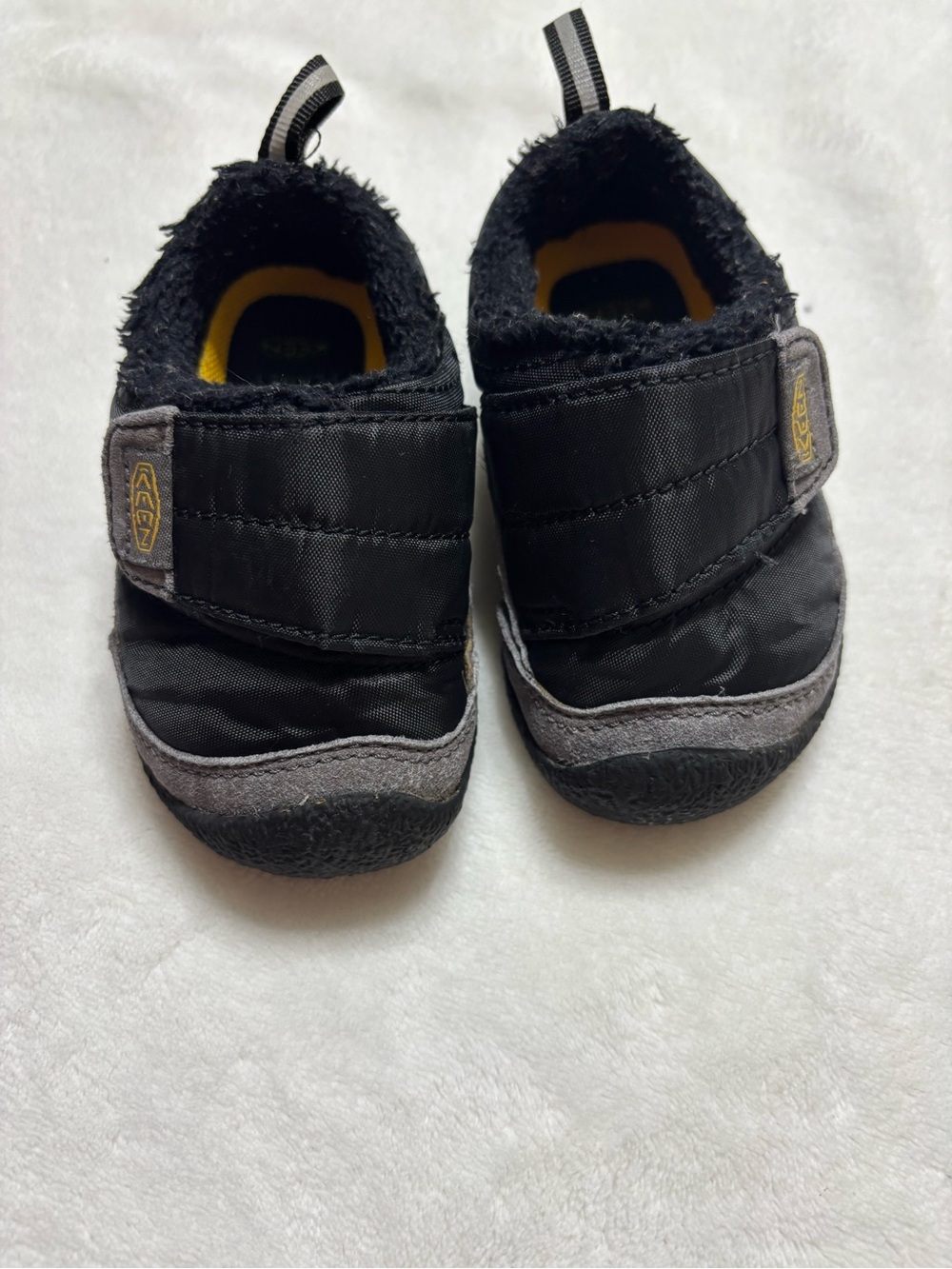 Keen Black and Gray Kids Slip-On Shoes with Yellow Logo